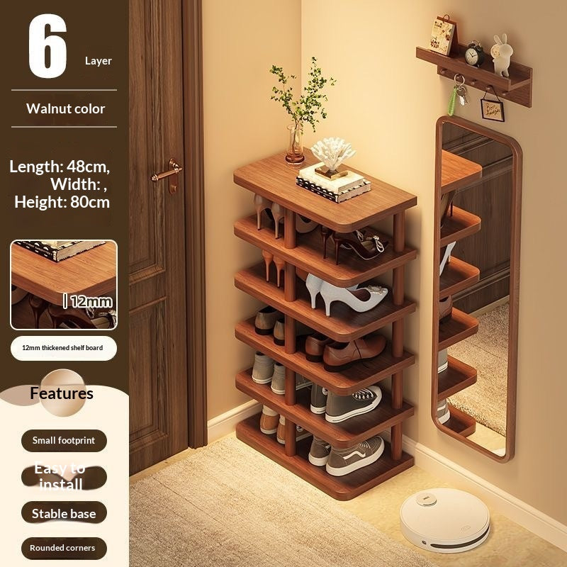 Eenvoudig laags houten schoenenrek huis